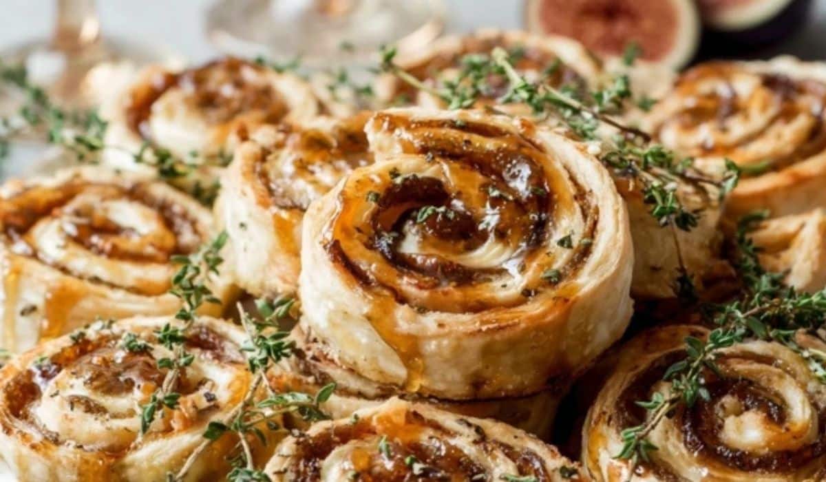 Golden Fig and Goat Cheese Pinwheels on rustic table