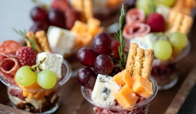 Mini Charcuterie Cups on rustic tray