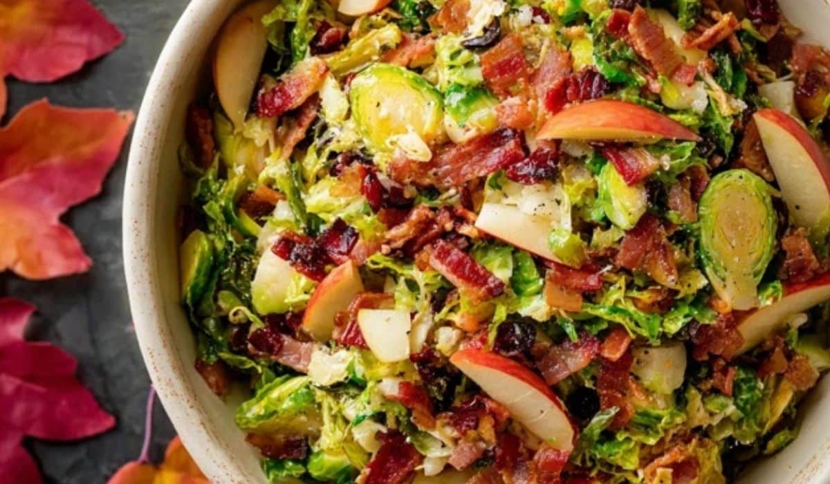 Warm Brussels Sprouts Salad with Bacon and Apple in fall setting