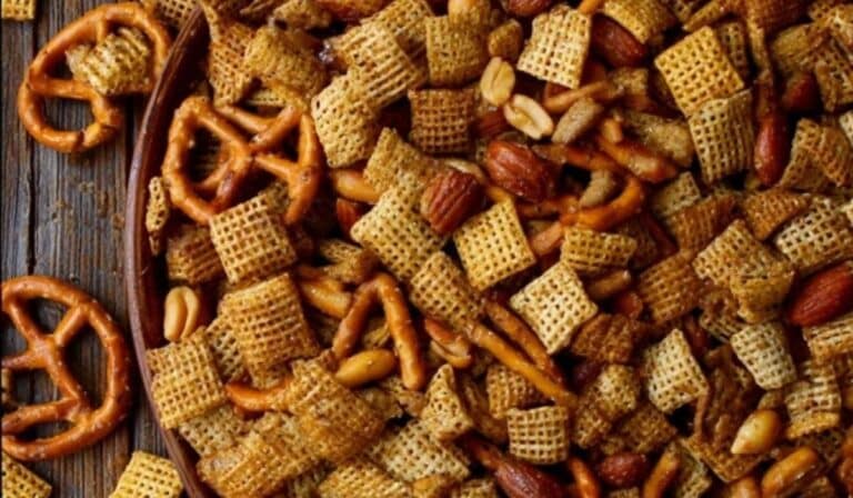 Homemade Chex Mix (Oven or Slow Cooker) in rustic bowl