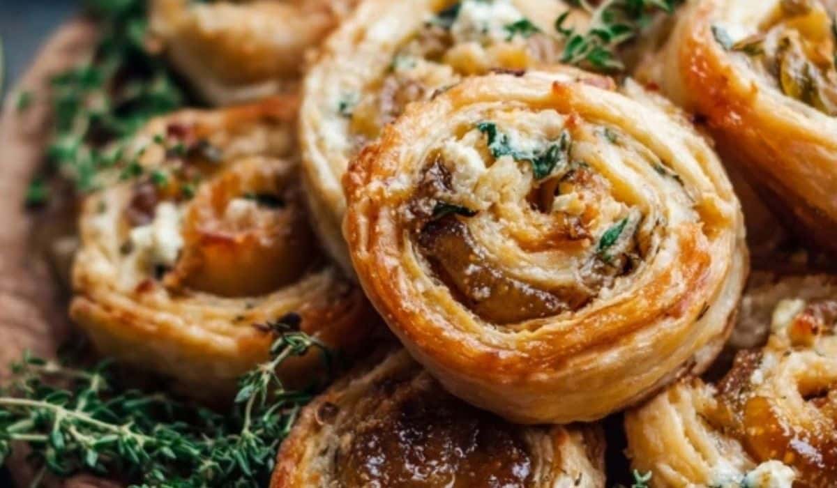 Fig and Goat Cheese Pinwheels on wooden board