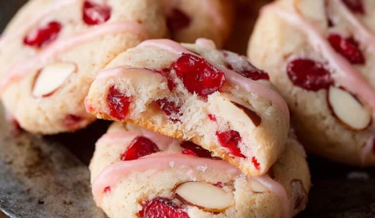 cherry almond shortbread cookies on wooden table
