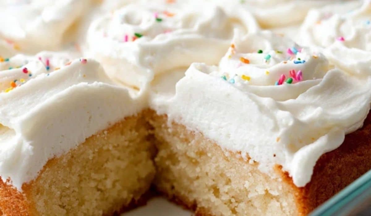 Vanilla Sheet Cake with Whipped Buttercream Frosting on a plate