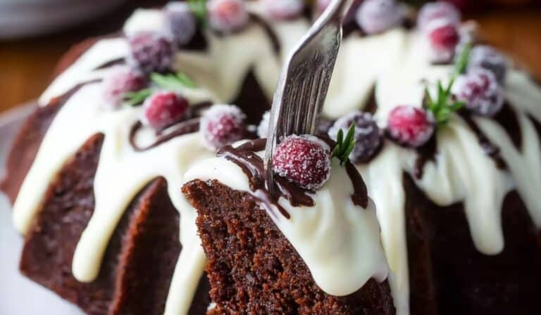 Chocolate Gingerbread Bundt Cake with Cream Cheese Frosting on holiday table
