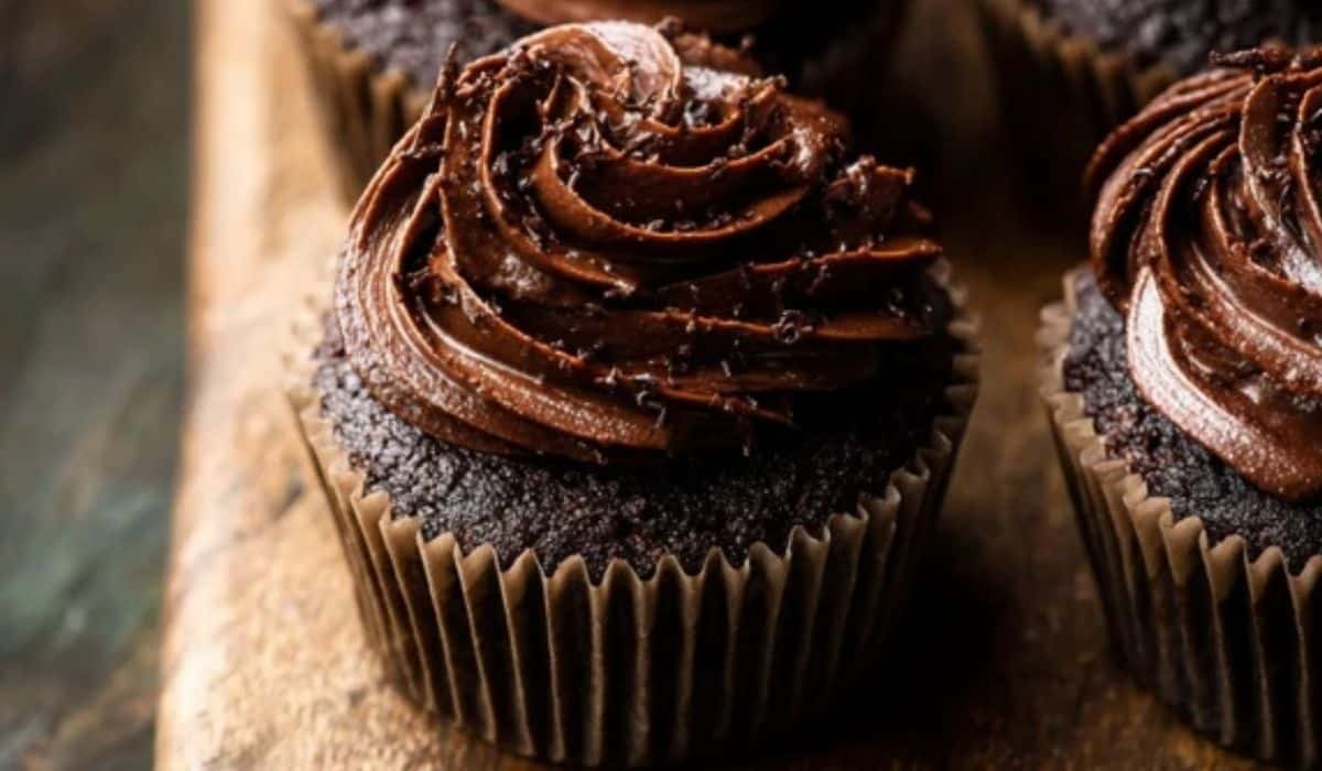 Super Moist Chocolate Cupcakes on tray with rich frosting