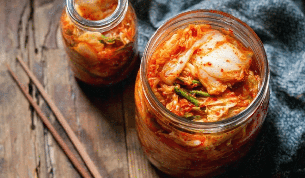 Homemade fermented kimchi in a glass jar, bright and crunchy