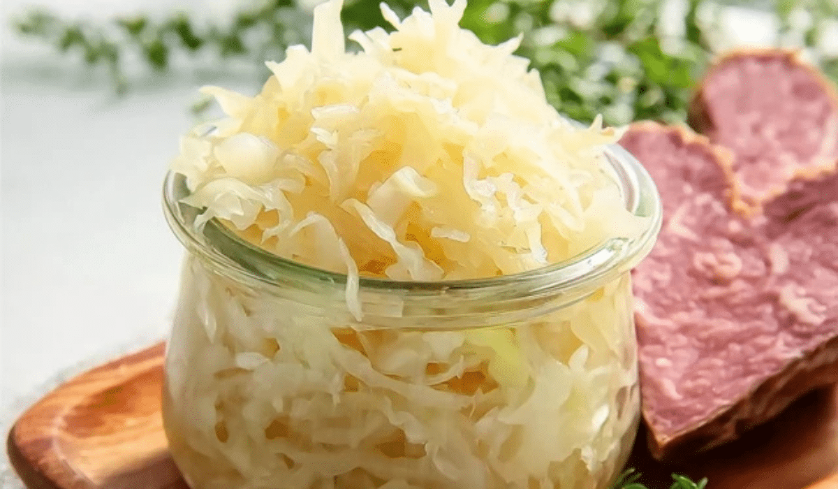 Easy Homemade Sauerkraut in a mason jar with cloudy brine