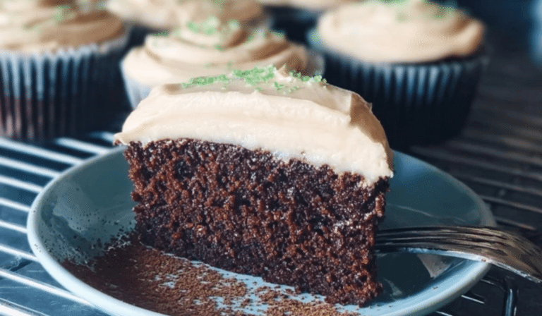 Guinness chocolate cake with Irish cream frosting on a cake stand